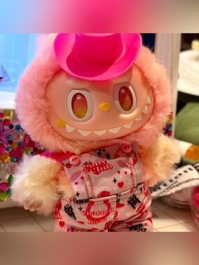 Chappell Roan Pink Pony Club Labubu Overalls outfit with cowboy hat bag charm ac